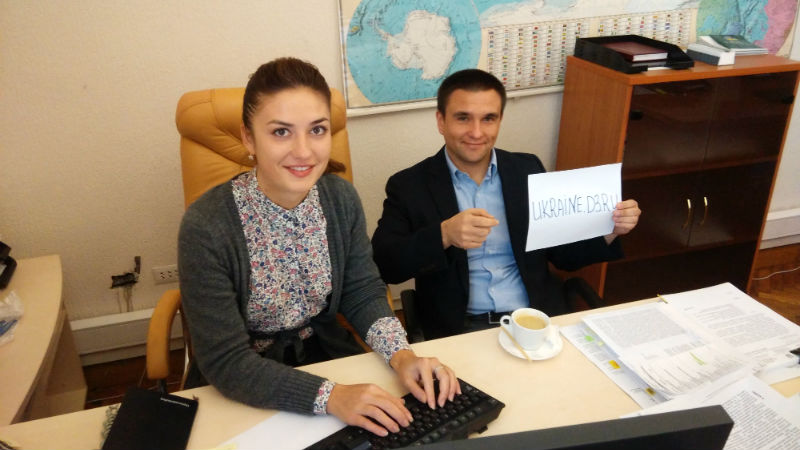 Pavel Klimkin holds up a piece of paper for a proof pic during his online chat. Image from Facebook.