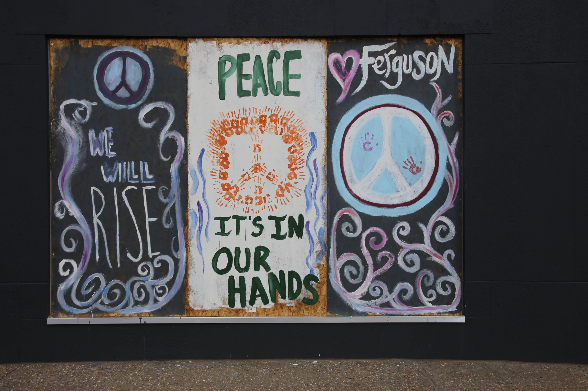 A Ferguson-themed window mural. Photo by Paul Sableman on Flickr. 
