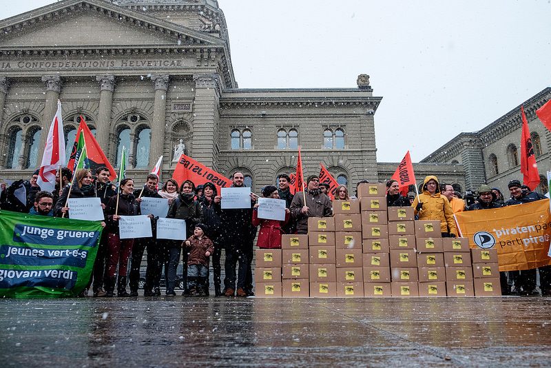 Swiss activists gather to deliver votes for referendum on surveillance law. Photo by JUSO Schweiz via Flickr (CC BY 2.0)