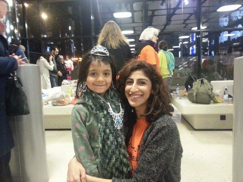 Faten Bushehri with a young refugee in Amsterdam (Photo credit: Lesvos  Refugee Emergency Aid.